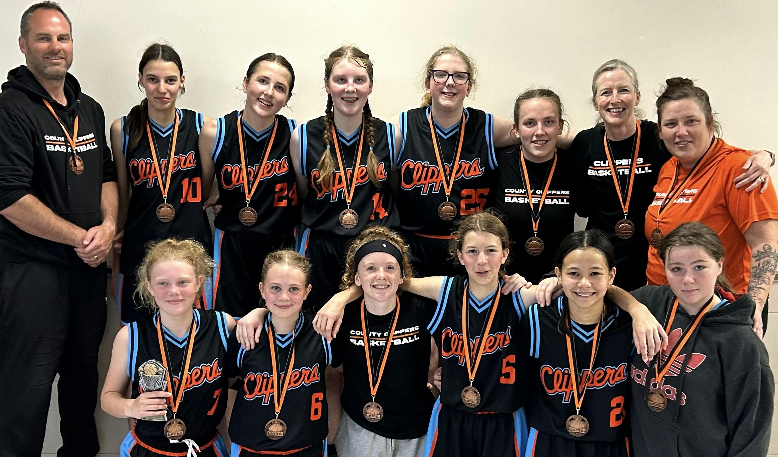 <p>The U14 County Clippers captured the bronze medal at their first annual County Clippers Spring Classic A tournament hosted at PECI April 12-14. Team members include (Front, left to right) Alia Vader, Joni Vader, Jooniper Taylor, Hartley Wallach, Aylie Heffernan, Madelyn Minns<br />
(Back, left to right): Coach Nathan Vader, Camilla Parsons, Remy Dullard-Krizay, Jessica Davis, Audrina Carty, Coach Chloe Lucas, Coach Sam Boardley and Coach Kylie Lucas. (Supplied Photo)</p>
