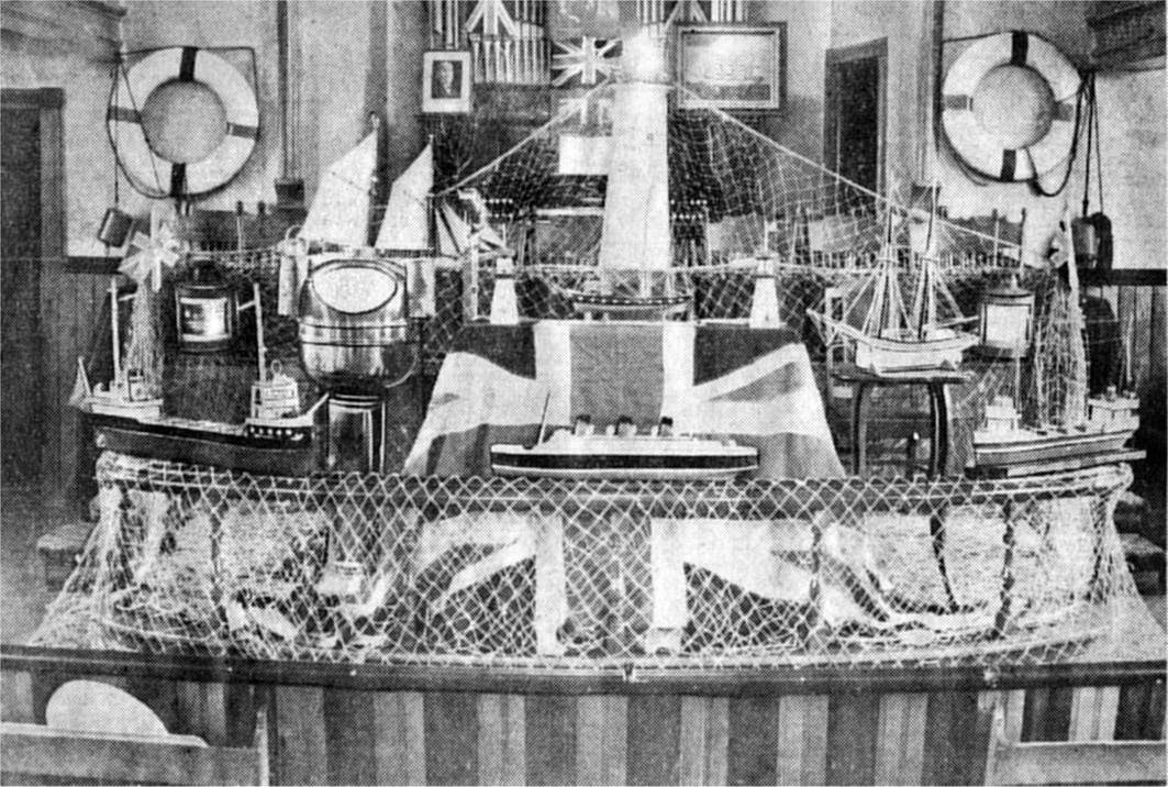 <p>This Gazette file photo from April 21, 1940, which appeared in a subsequent Toronto Telegram article, shows the decorated dais from that year’s Mariners’ Service. The decorations from the scene above were donated by several seafaring families from all corners of Prince Edward County and beyond. (Courtesy Naval Marine Archive-The Canadian Collection)</p>
