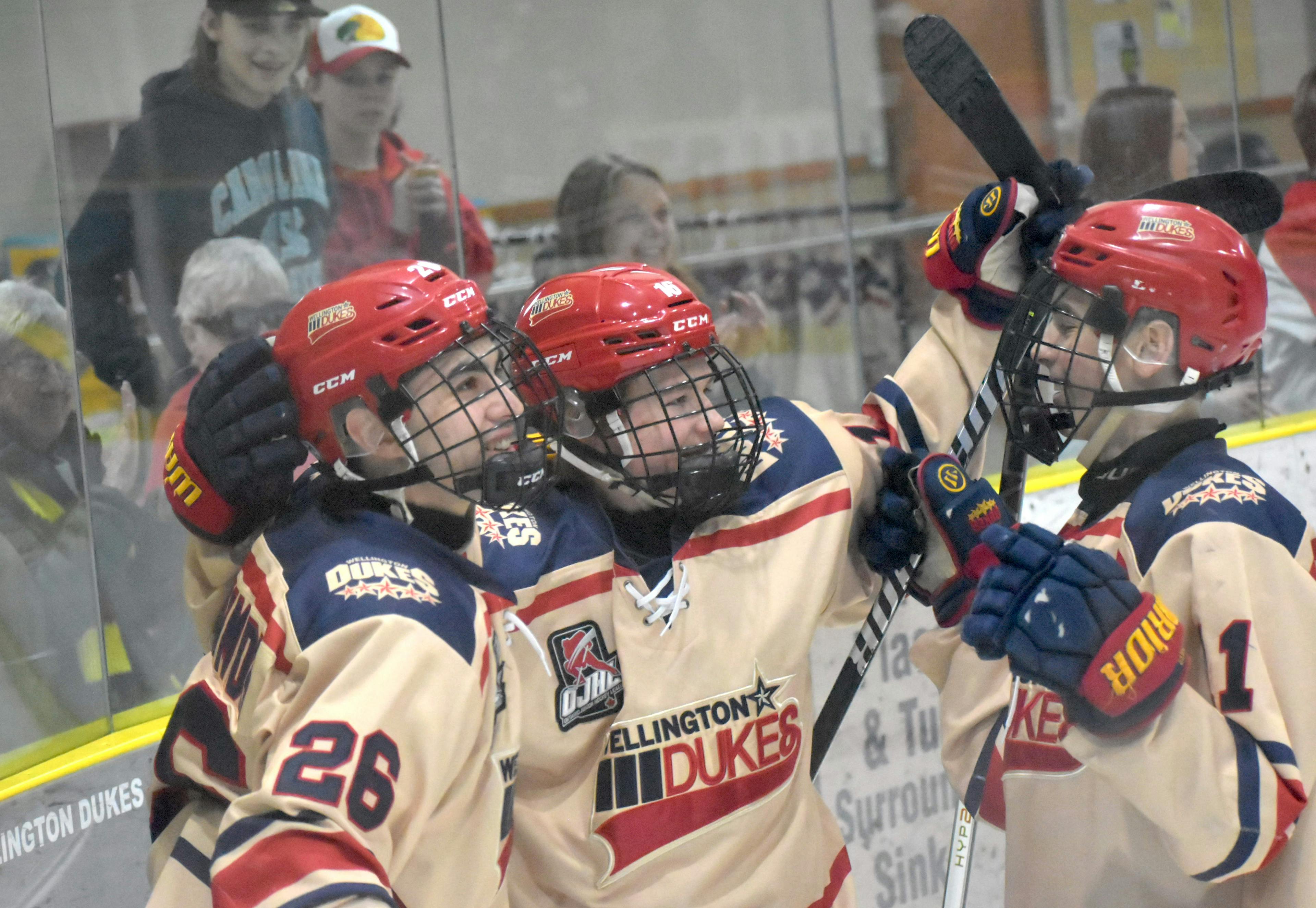 <p>(Left) Wellington Dukes Pana Efraimidis and (Right) Zander Latreille celebrate (Centre) Nick Dipaolo’s<br />
first period breakaway goal in the club’s 8-1 win at home over the visiting Lindsay Muskies on Sunday.<br />
(Jason Parks/Gazette Staff)</p>
